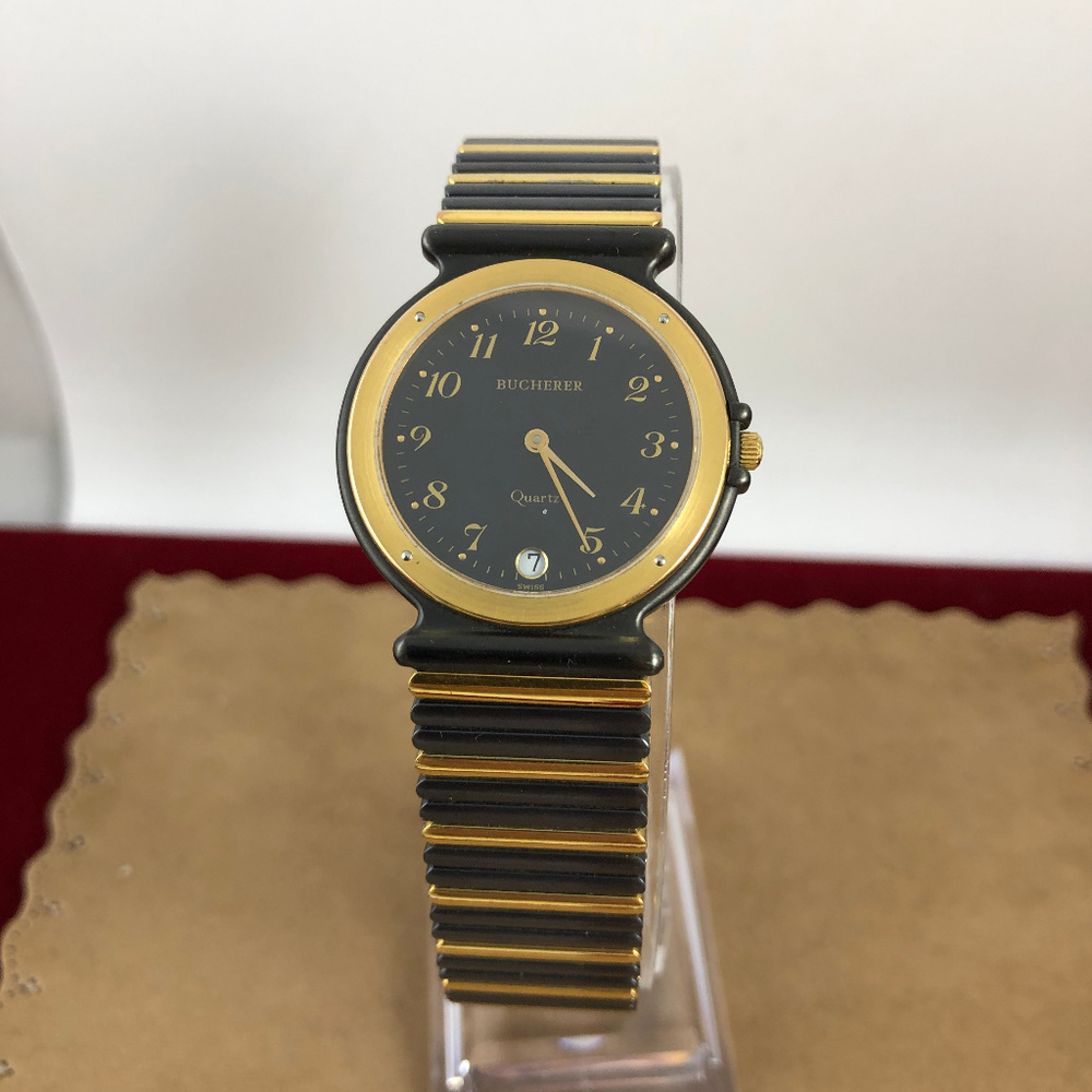 Carl Bucherer Gold and Black Swiss Watch Swiss 6 Jewel Quartz Movement